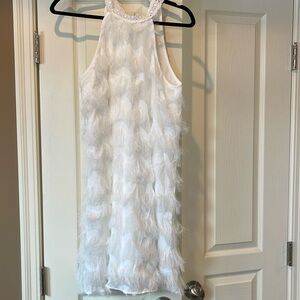 White multi material dress super cute snug around the neck with lace. Size Small
